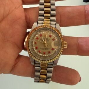 Rolex Gold and Silver Watch with Red Details